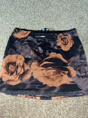 Fashion Nova Black Mini Skirt with Brown Rose Print